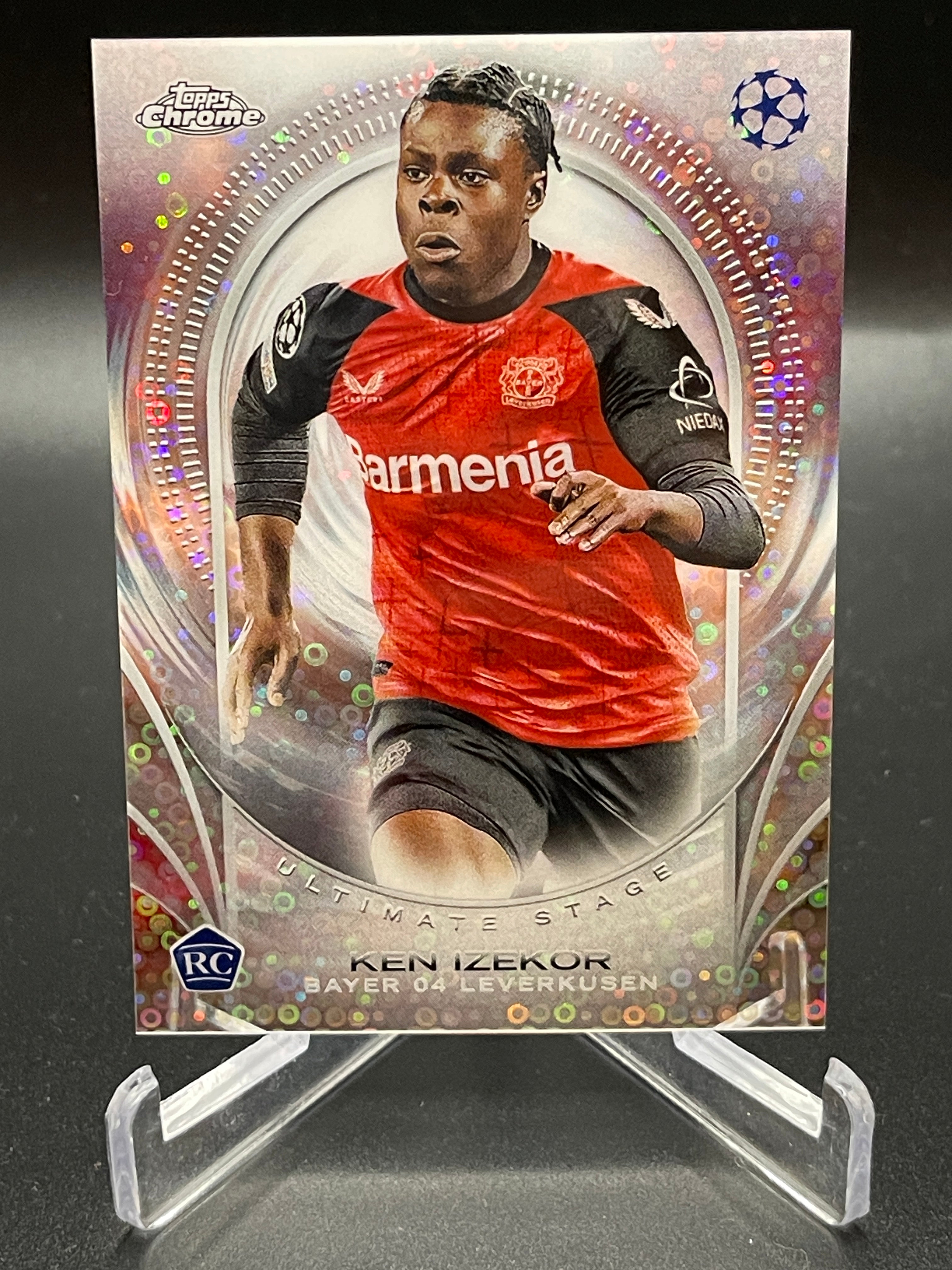 Ken Izekor Ultimate Stage FC Bayer 04 Leverkusen - 2024/25 Topps® UCC Club Competitions Flagship